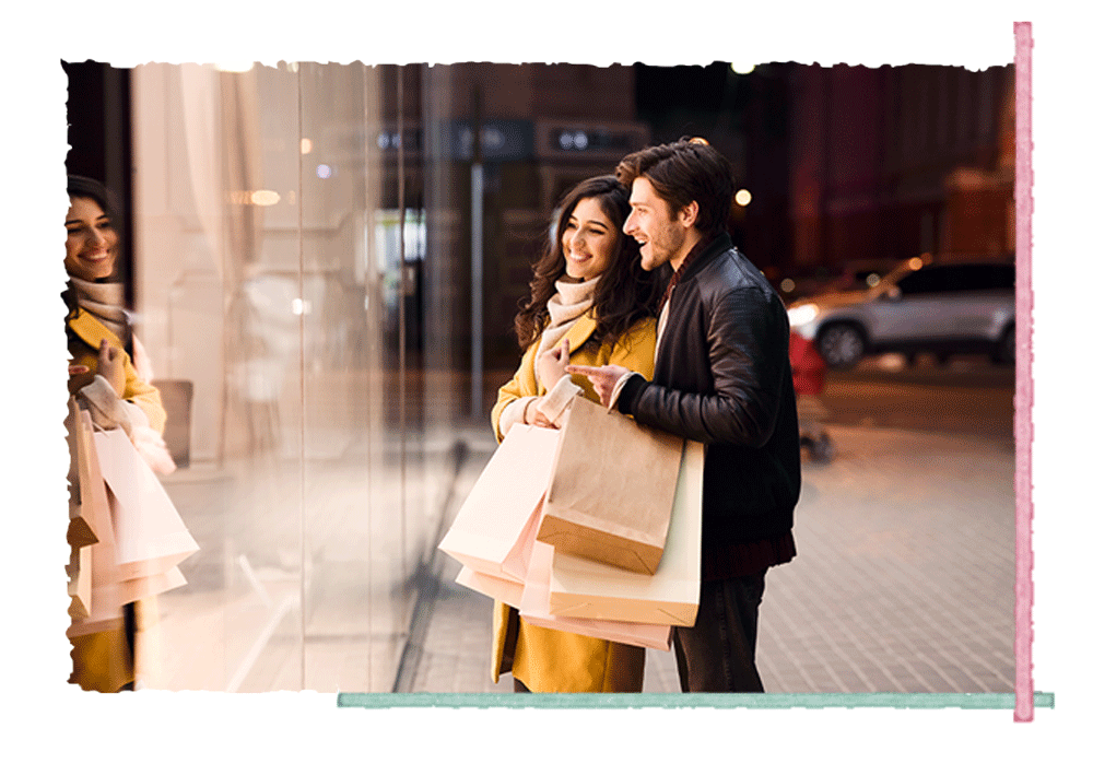 Man and woman looking at a window display